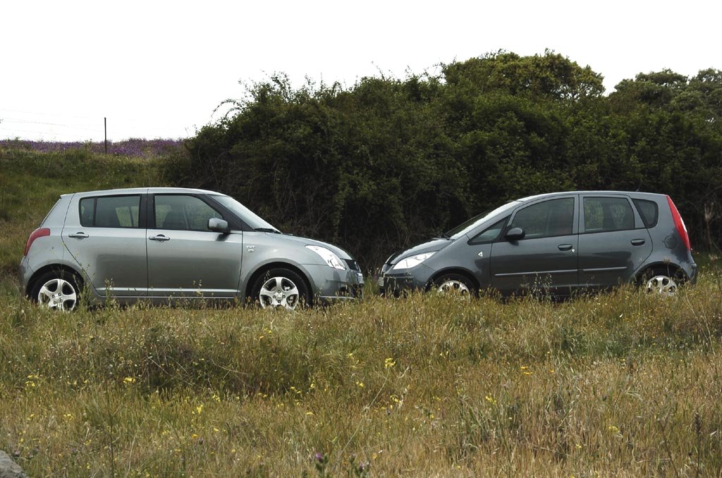 Fotos del Mitsubishi Colt 1.5 vs Suzuki Swift 1.5